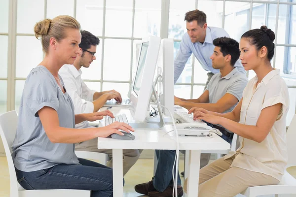 Business team working on computers