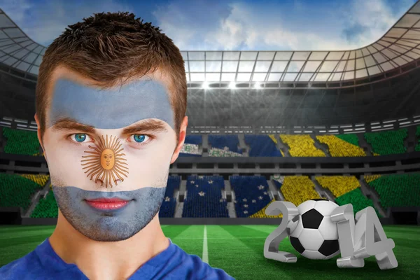 Composite image of serious young argentina fan with face paint