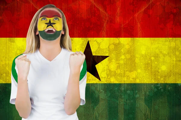 Excited ghana fan in face paint