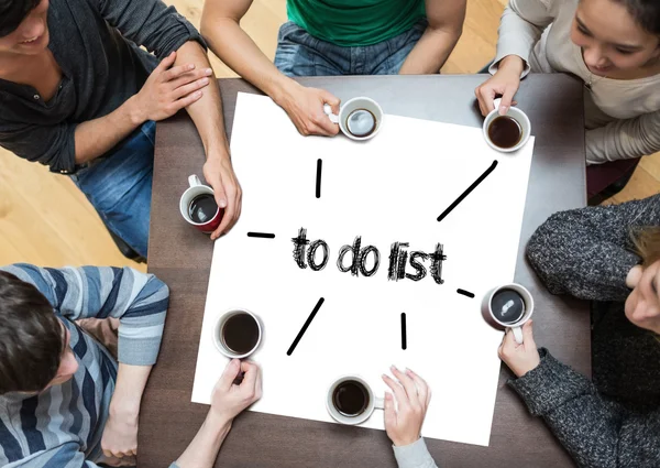 To do list on page with people around table