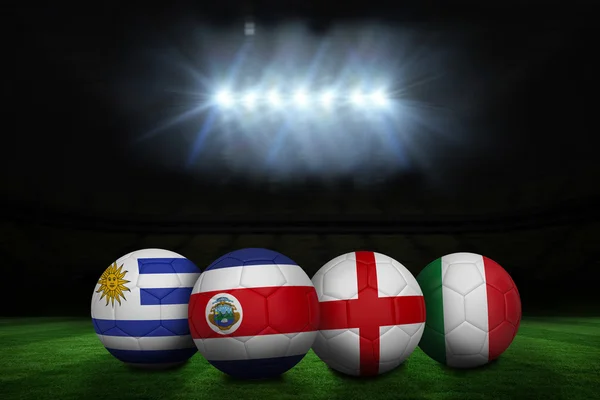 Composite image of footballs in group d colours for world cup