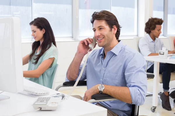 Man with disability on telephone