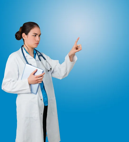 Doctor in lab coat holding tablet
