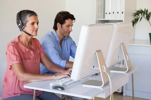 Business team using computers