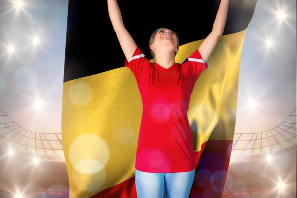 Football fan holding belgium flag