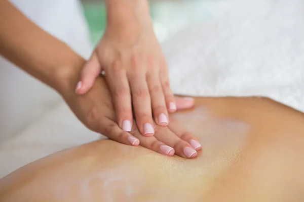 Woman getting back massage