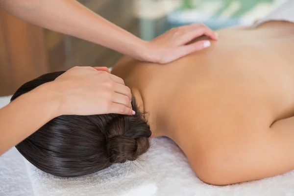 Brunette enjoying massage