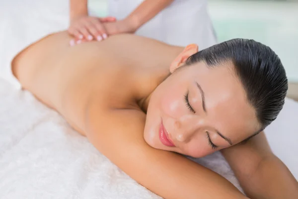 Brunette enjoying a back massage