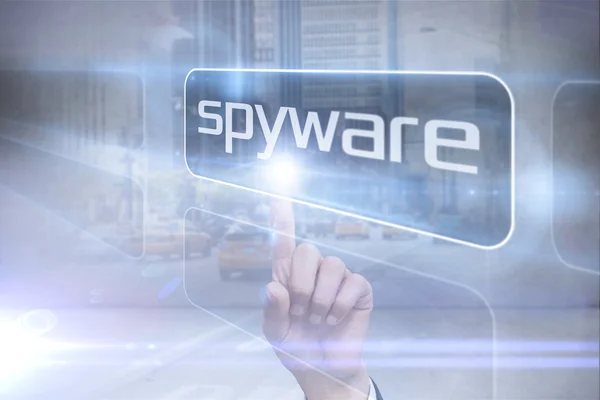 Businessman pointing to word spyware