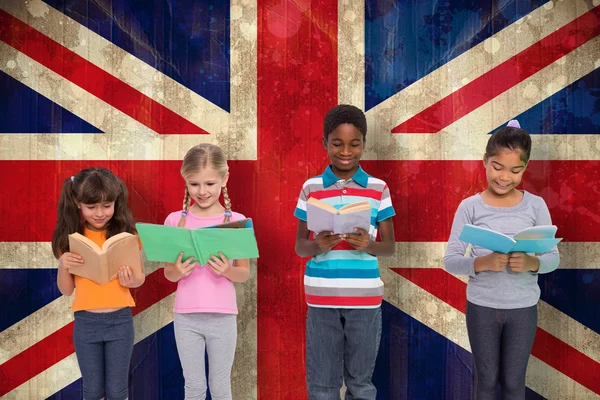 Pupils reading against union jack flag