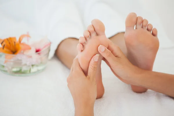 Woman receiving foot massage