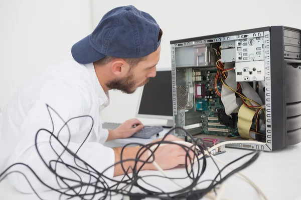 Computer engineer working on broken console