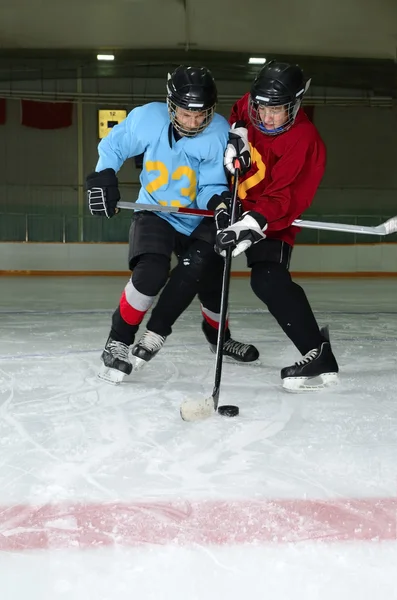 Hockey Player Scrimmage in Rink