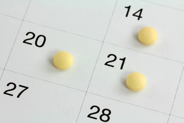 Birth Control Pills on a calendar