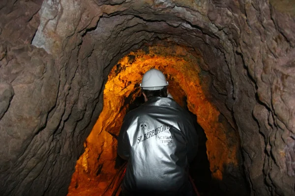 Tourists explore the mine using mini railway at the Silver Mine, Austria