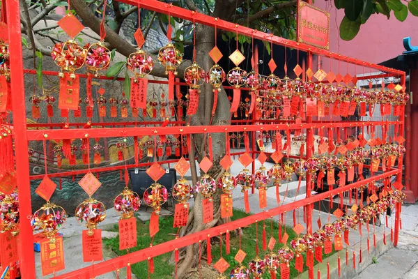 Red Prayer Papers and Remembrances with Bells at A-Ma Temple, Macau