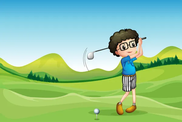 A boy playing golf