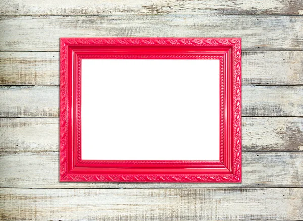 Red Vintage picture frame on old wood background