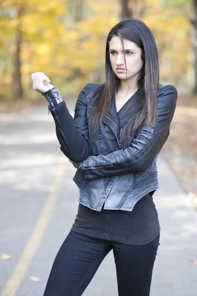 Girl posing in a leather jacket