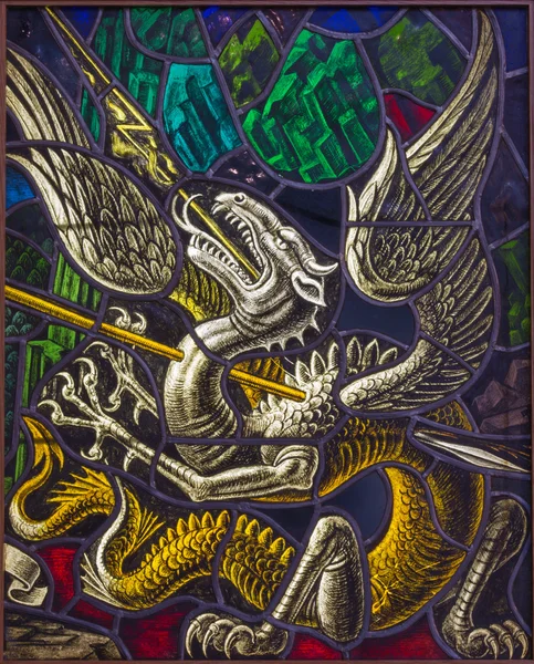 ANTWERP, BELGIUM - SEPTEMBER 5: Dragon as symbol of Devil. Windowpane of duel of St. Georeg with the Devil in Joriskerk or st. George church on September 5, 2013 in Antwerp, Belgium