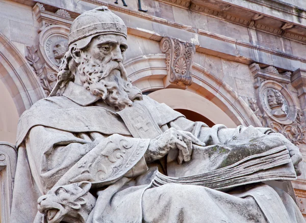 MADRID - MARCH 11: Saint Isidore of Seville from Portal of National Archaeological Museum of Spain projected by architect Francisco Jareno and built from 1866 to 1892 on March 11, 2013 in Madrid.