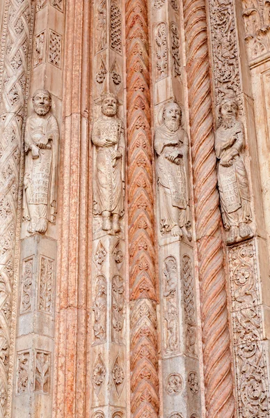 VERONA - JANUARY 27: Detail of prophets statues from main portal of Duomo on January 27, 2013 in Verona, Italy