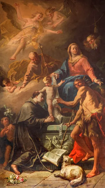 VENICE, ITALY - MARCH 13, 2014: The Holy Family with the st. Anthony of Padua  and st. John the Baptist by Gaspere Diziani 1755 in church Chiesa dei Santi. XII Apostoli