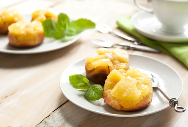 Individual pineapple upside-down cakes