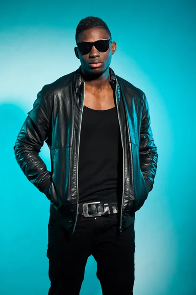 Cool urban stylish black american man. Fashion studio shot.