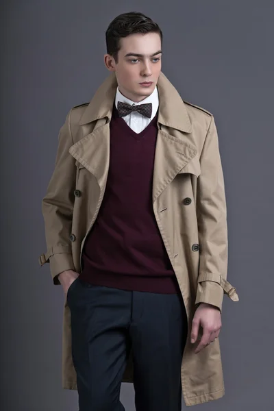 Retro fifties english style fashion young man with light brown r