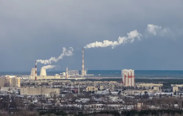 Industrial smoke stack of power plant in city. Ukraine. Kiev.