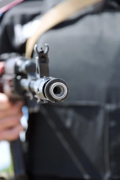 Kalashnikov machine gun in the hands of Ukrainian soldier.