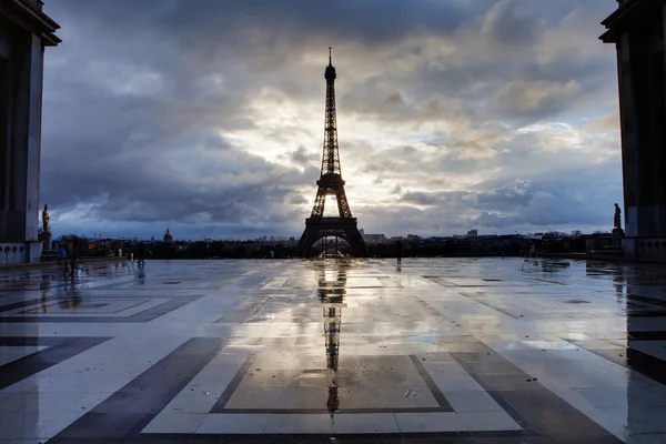 Reflection of Eiffel Tower from Paris with clouds
