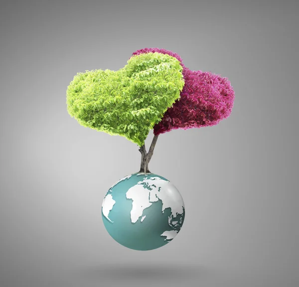 Small peaceful green planet ,tree on globe