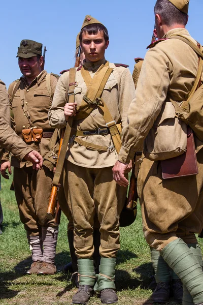 Members of Red Star history club wear historical Soviet uniform during historical reenactment of WWII