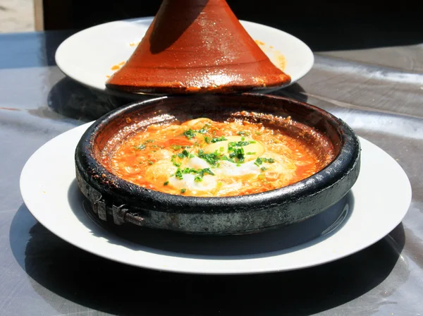 Morocco national dish - tajine of meet with eggs and vegetables