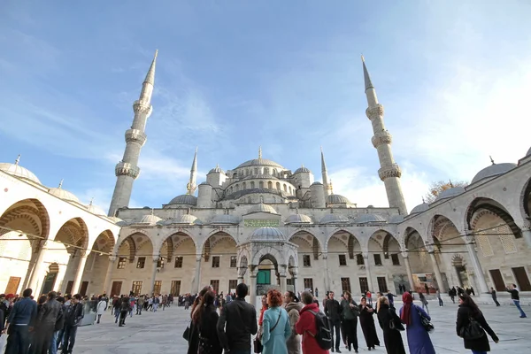 Tourists in the courtyard of Sultanahmet Mosque on December 08, 2012 in Istanbul, Turkey.