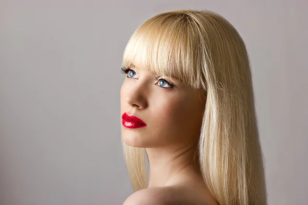Blonde woman with red lips