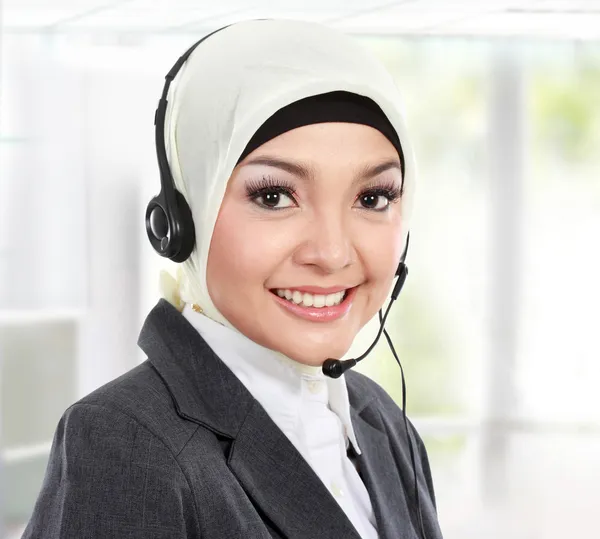 Beautiful Muslim woman customer service operator