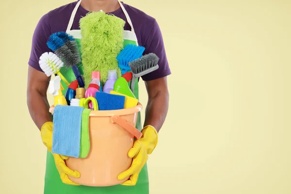 Portrait of man with cleaning equipment