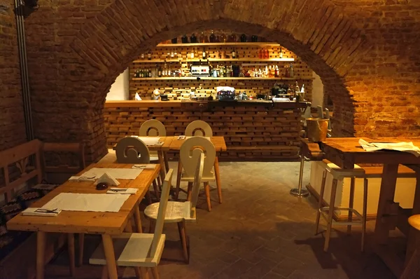 Internal view of a winery with stone walls