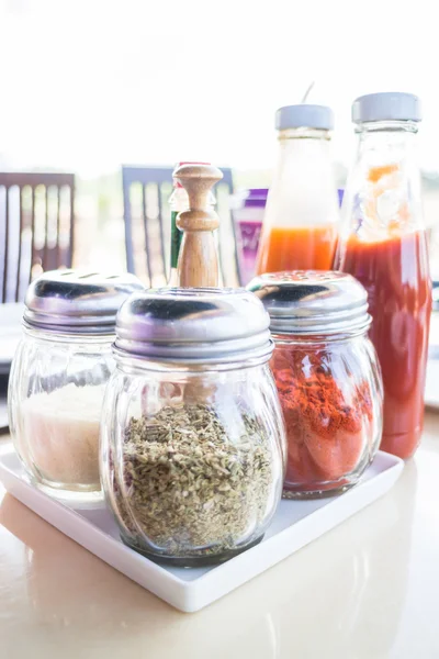 Set of seasoning and sauce bottles