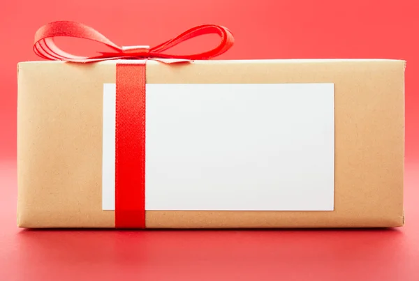 Wrapped gift box with greeting card