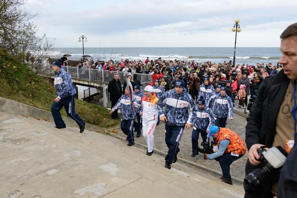 Olympic torch bearer participates in relay of Olympic Flame on October 29, 2013 in Svetlogorsk, Russia