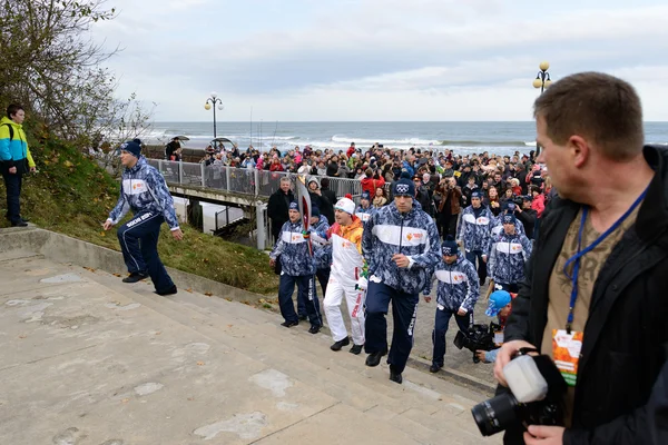 Olympic torch bearer participates in relay of Olympic Flame on October 29, 2013 in Svetlogorsk, Russia