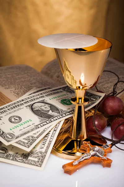 Holy communion and dollar bill — Stock Photo #43391077