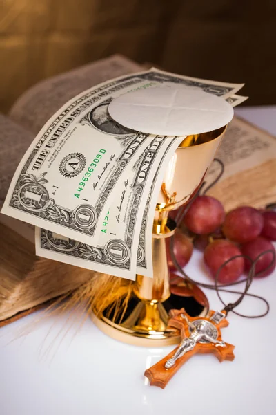 Holy communion and dollar bill