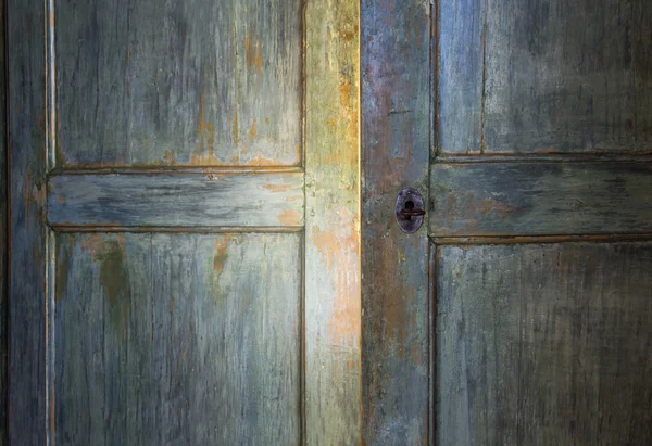 Green antique wooden door