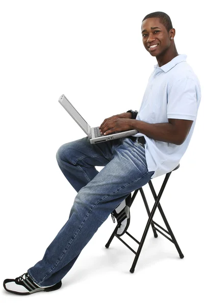 Attractive Young Man With Laptop Computer