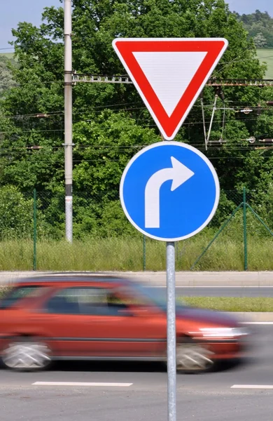 Moving car and traffic signs